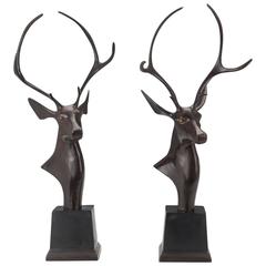 A Pair of Bronze Cervidae Sculptures