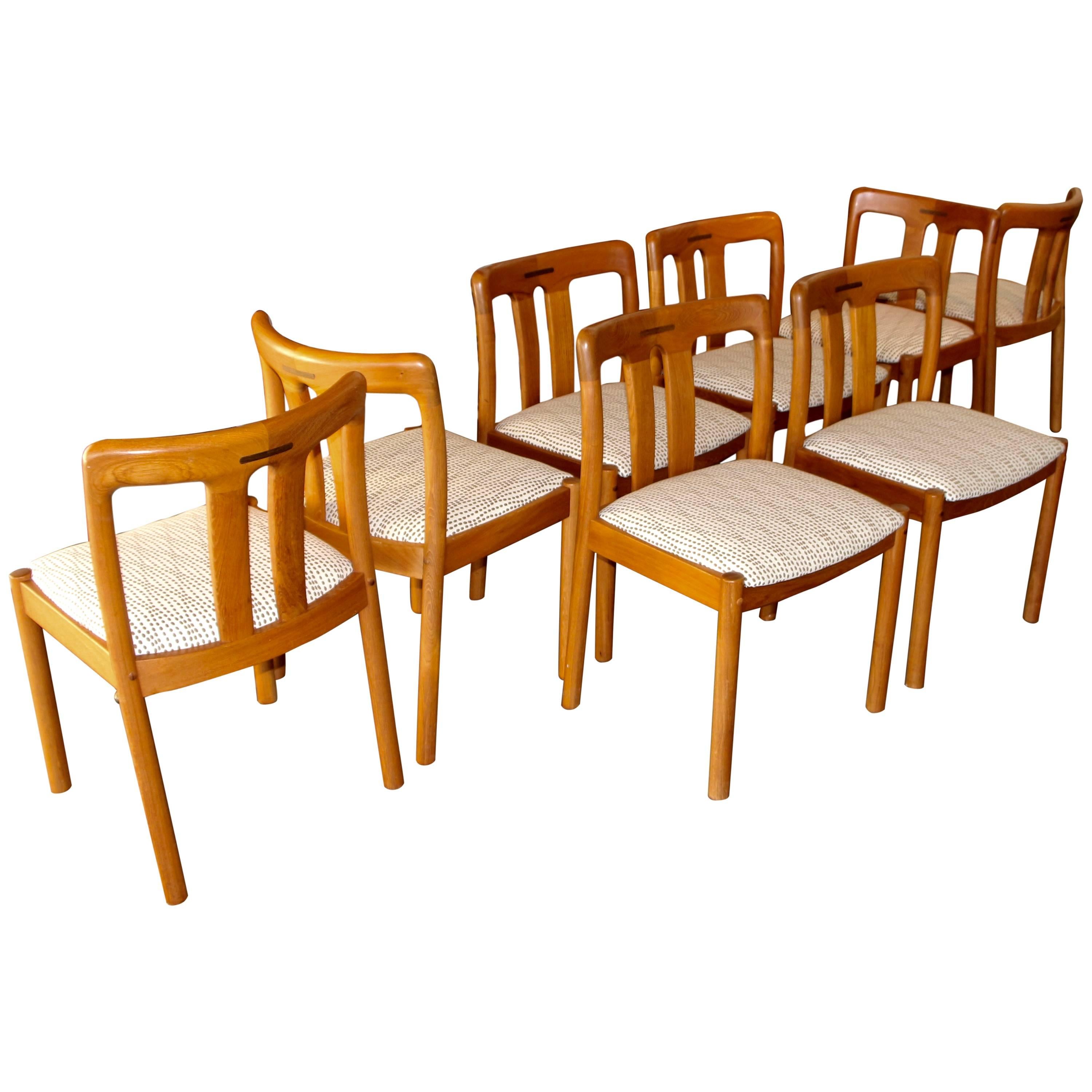 Eight Uldum Teak Dining Chairs with Rosewood Inlay