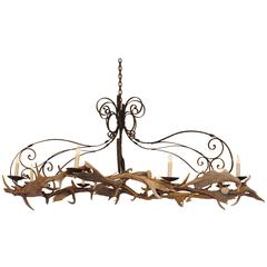 Antique Large Oval Shaped Italian Wrought Iron and Daino Antler 8-Light Chandelier, UL