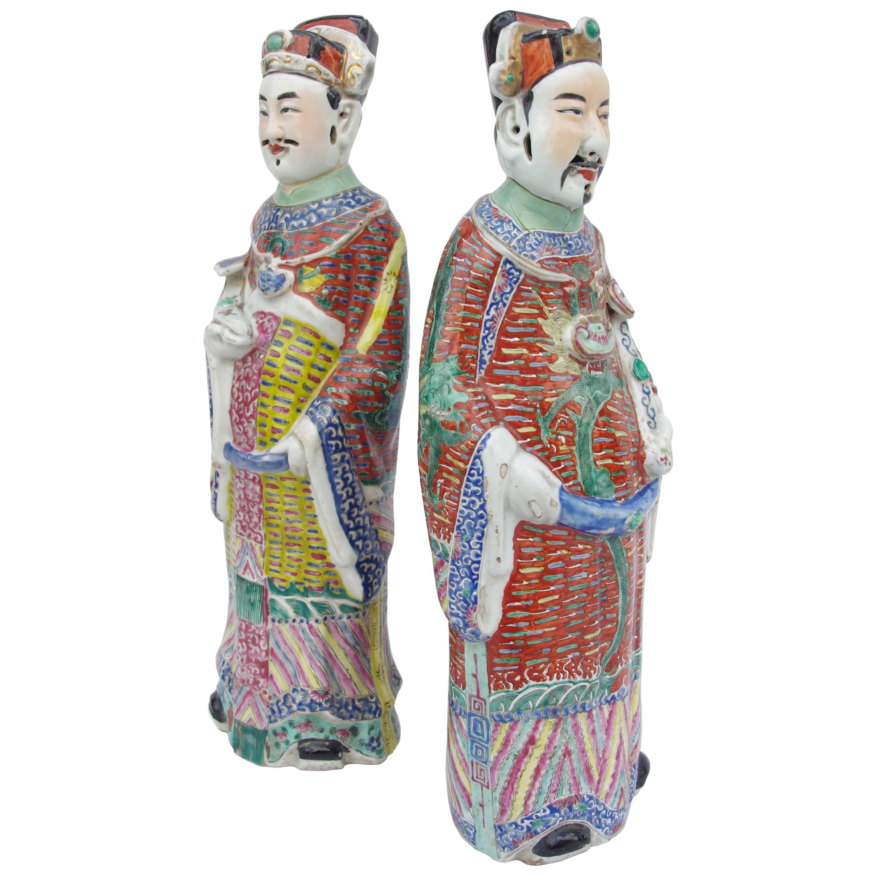 Pair of Chinese dignitaries in polychrome faience, 1900 period
