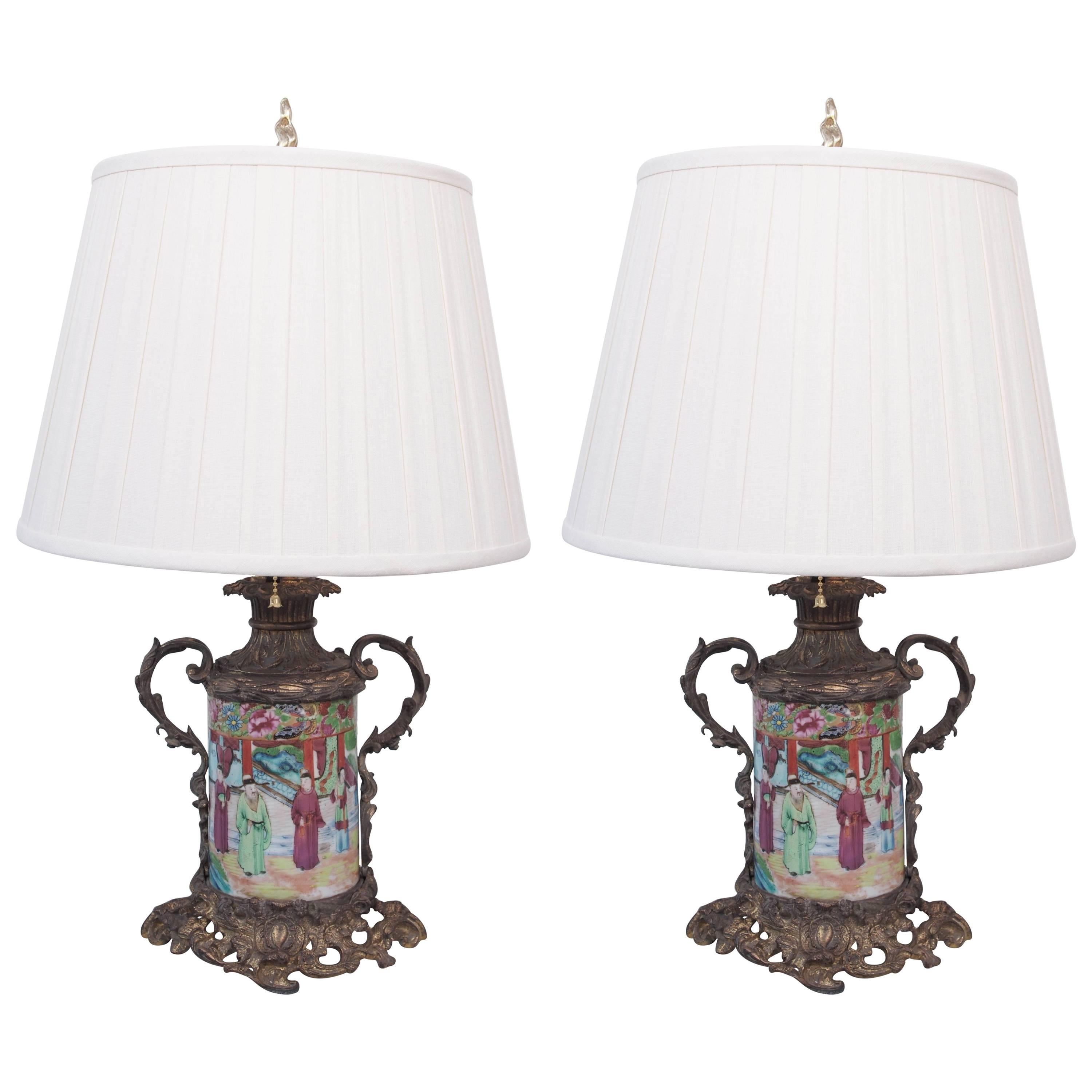 Pair of Rose Medallion Bronze Mounted Carcel Lamps For Sale