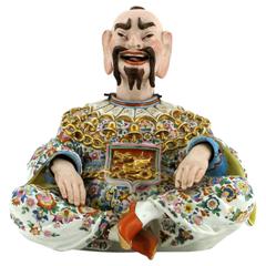 A Jacob Petit porcelain pagoda figure of a bearded Chinaman