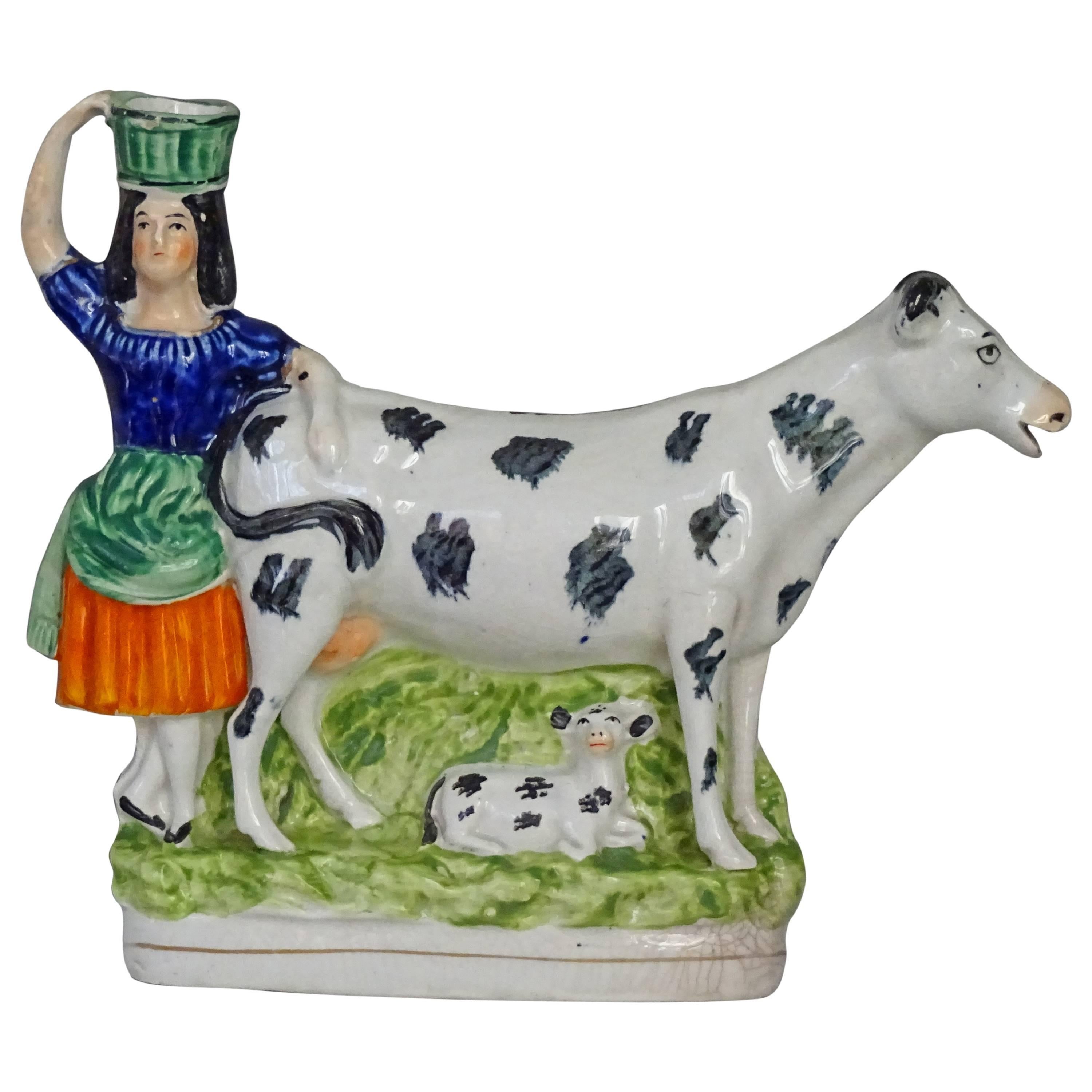 Staffordshire Milkmaid with Cow and Calf