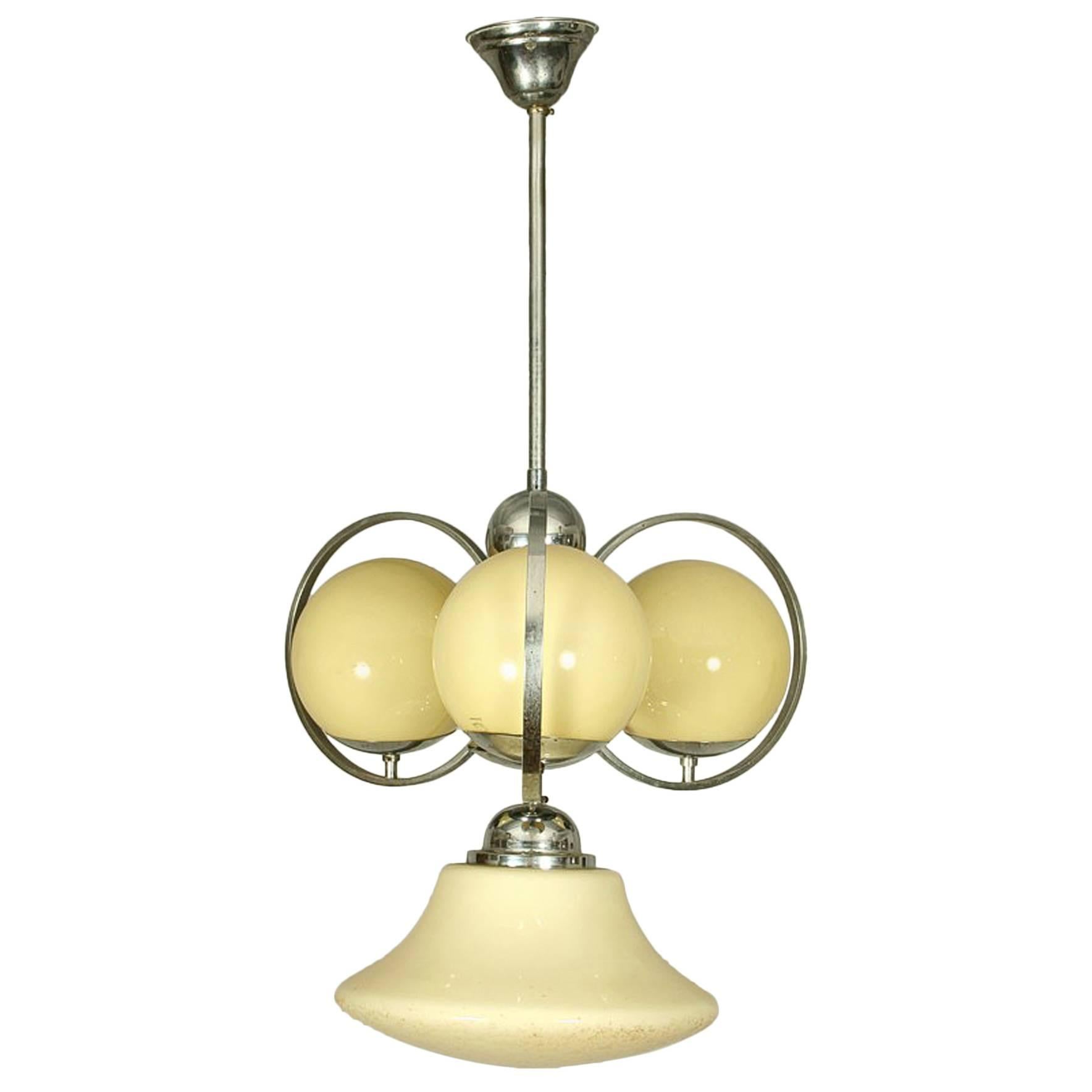 Lustre à boules art déco en vente