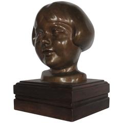 Bronze Head of a Girl on a Solid Wooden Base by Petermann