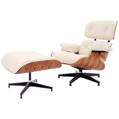 Vintage Rosewood Eames Lounge Chair and Ottoman with New Herman Miller Cushions