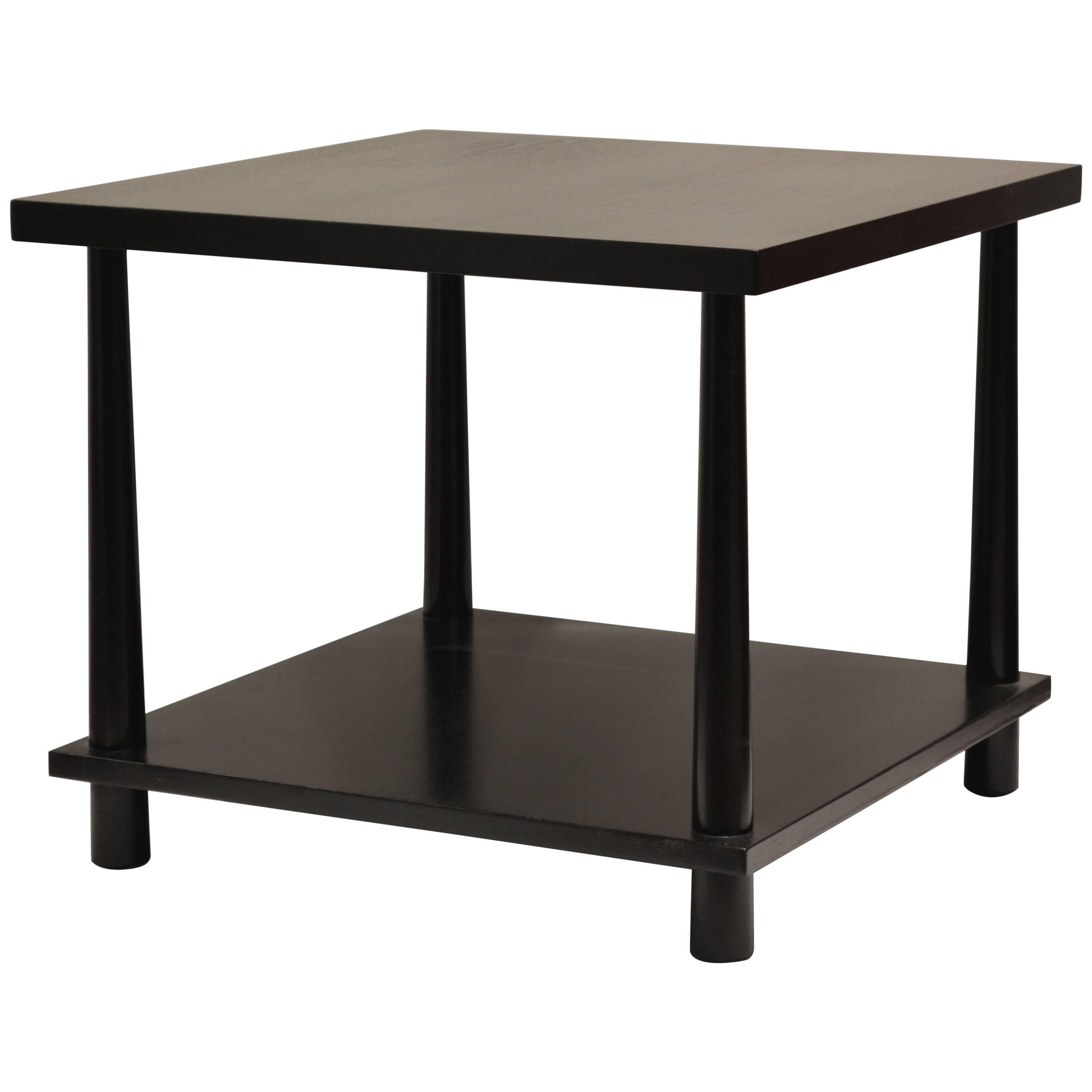 Reverse tapered leg square side table with black lacquered finish. With original label 