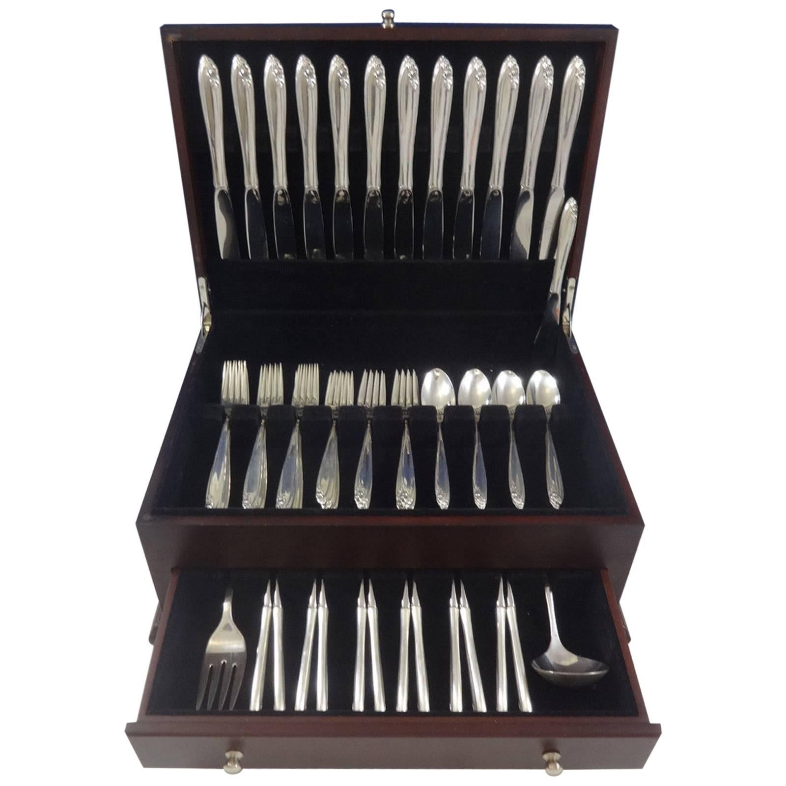 Lovely Debutante by Wallace sterling silver flatware set of 63 pieces. This set includes:

12 knives, 9 3/8