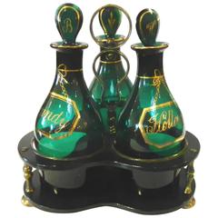 Antique Tantalus with Bristol Green Decanters