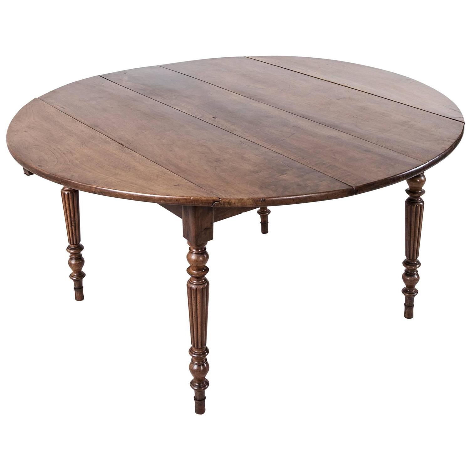 Period Louis Philippe Solid Walnut Round Dining Table with Turned Fluted Legs at 1stdibs