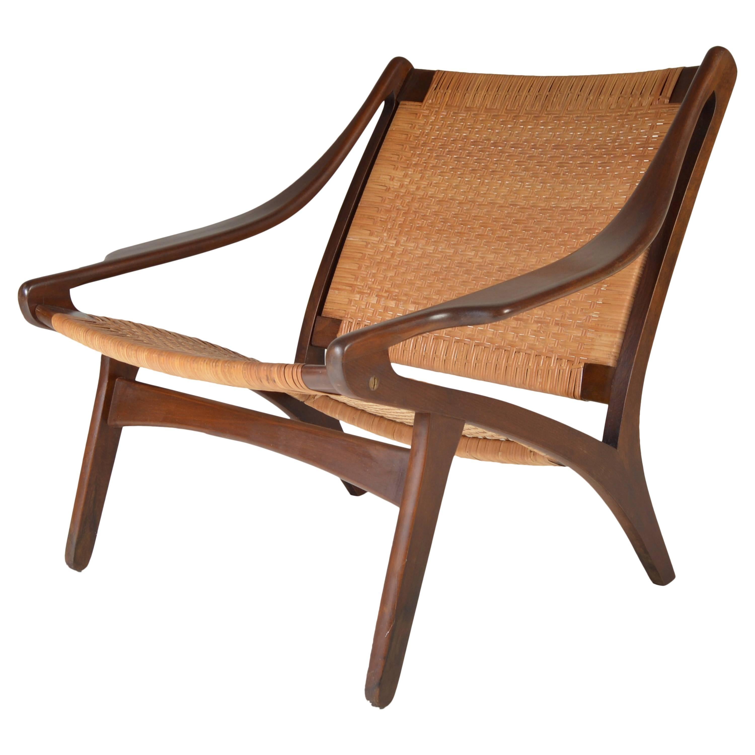Early IB Kofod Larsen Walnut and Cane Easy Chair at 1stDibs