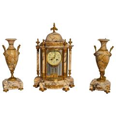 A beautiful French marble & ormolu clock garniture.