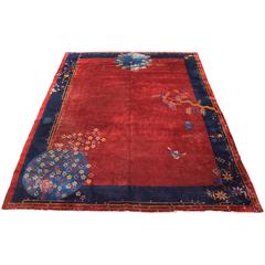 Elegant Red Grounded Chinese Peking Rug, Early 20th Century