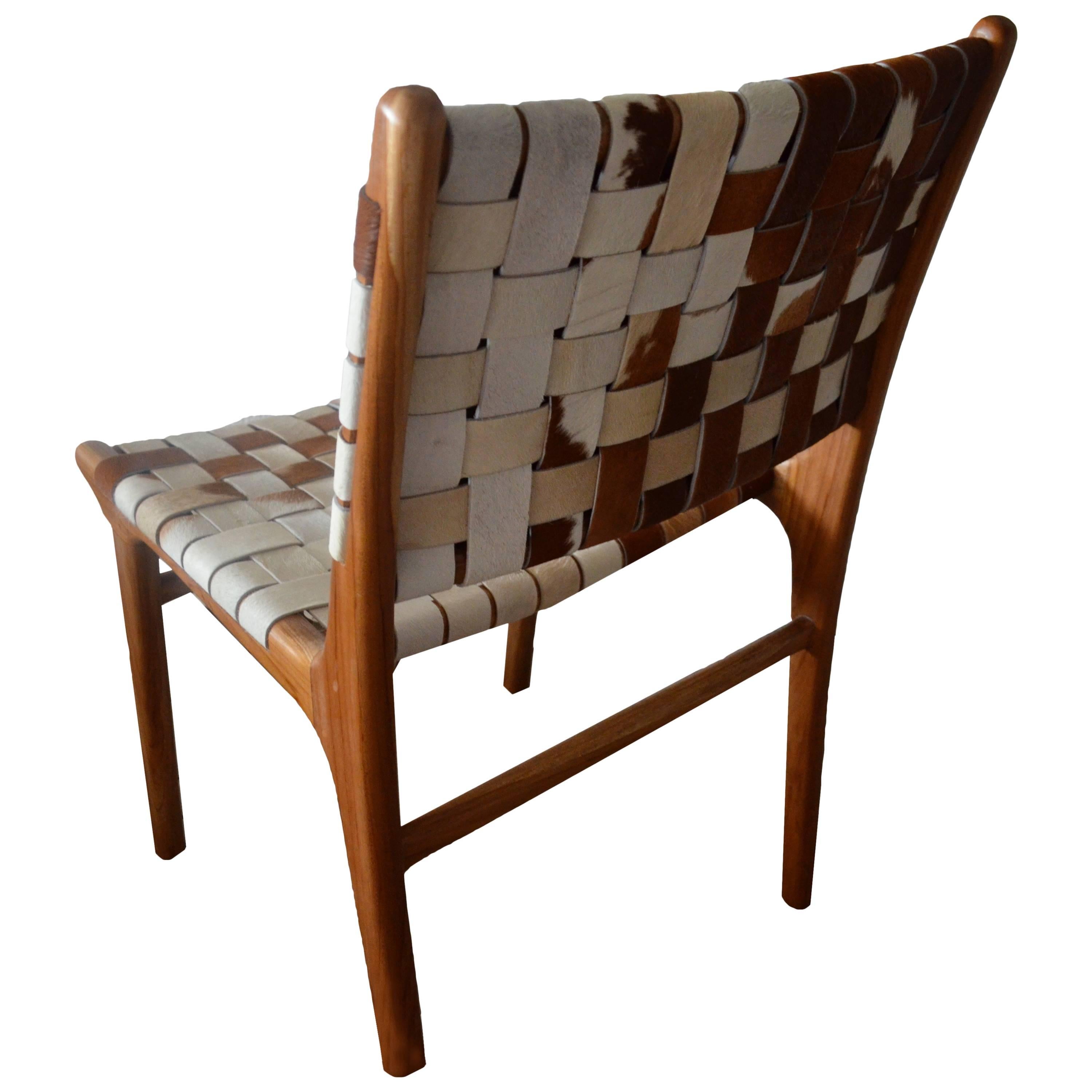 Premium quality double-back woven cowhide with teak wood frame.

Introducing the Premium Quality Cowhide Chair in the new double-back woven style. We utilize the finest quality cowhide for our modern chairs. The hand-selected cowhide is carefully