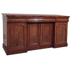 Antique English flame mahogany 4-door sideboard