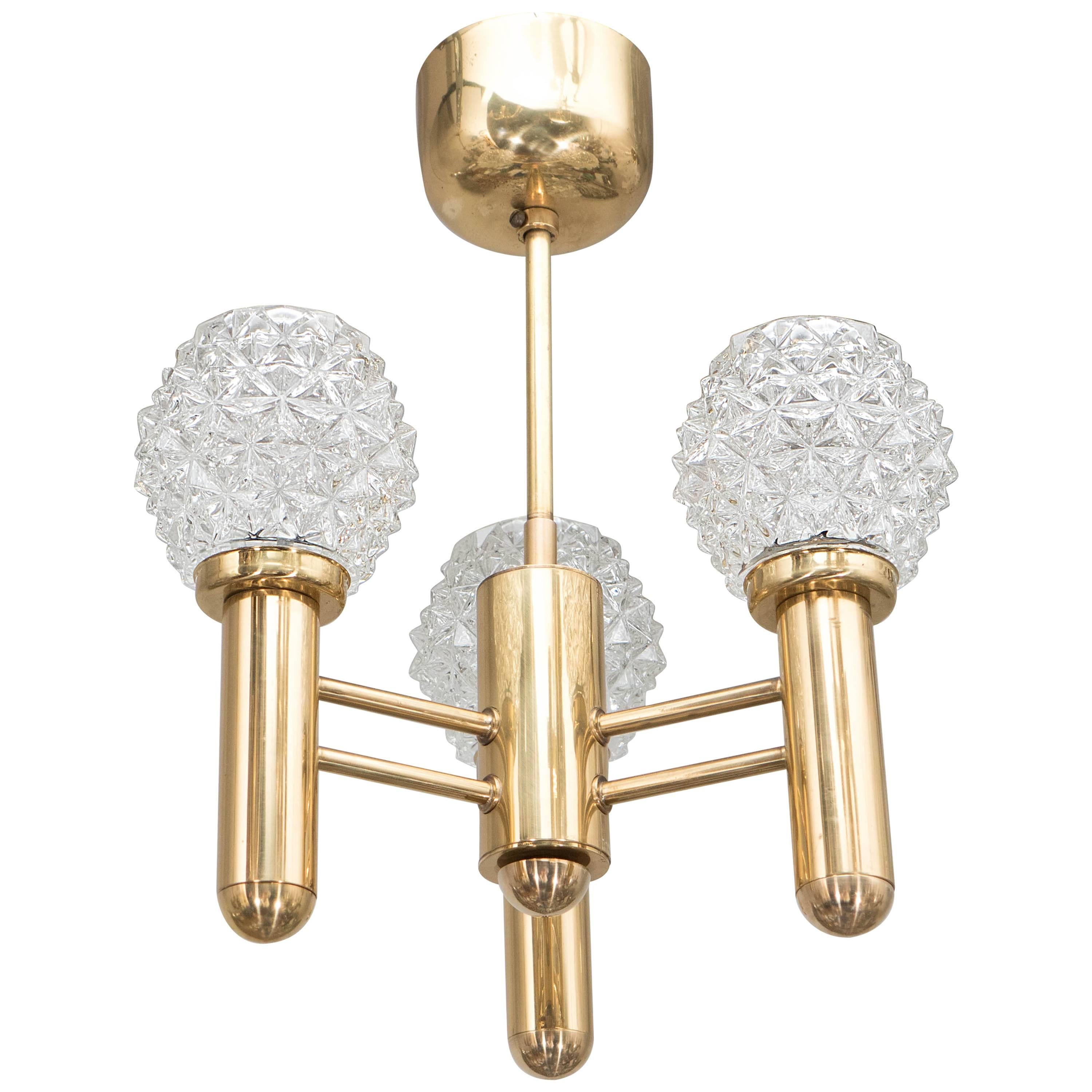 Mid-Century Modern Three-Arm Brass Chandelier with Faceted Glass Globes For Sale