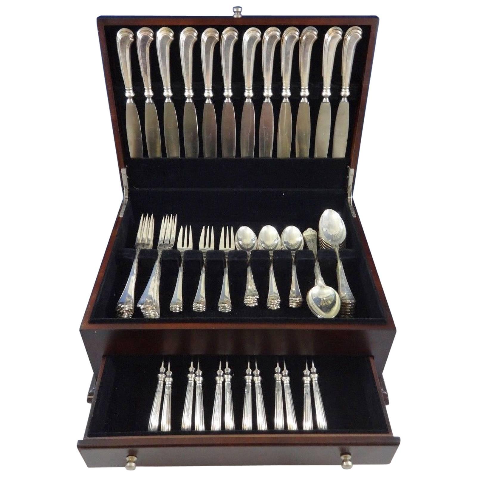 St. Mark 800 silver flatware set of 72 pieces. The knives have wonderful pistol grip handles. This set includes:

12 dinner knives, 10