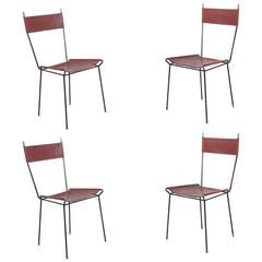 Set of Four Italian Leather and Metal Dining Chairs with Brass Caps