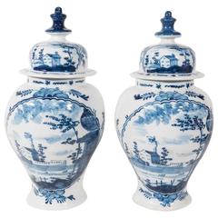 Pair of Late 18th Century Blue and White Dutch Delft Covered Mantel Vases