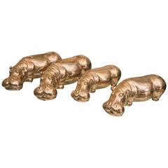 Used Pod of Gold Tinted Glazed Ceramic Hippopotami Sculptures