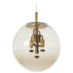 Large Limburg Pendant Light Brass and Amber Glass Globe, 1960s