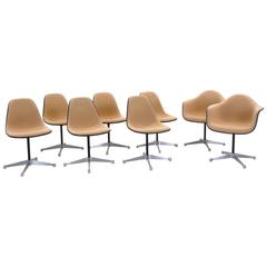 Set of Eight Upholstered Eames Swivel Dining Chairs, Two Arm and Six Side Chairs