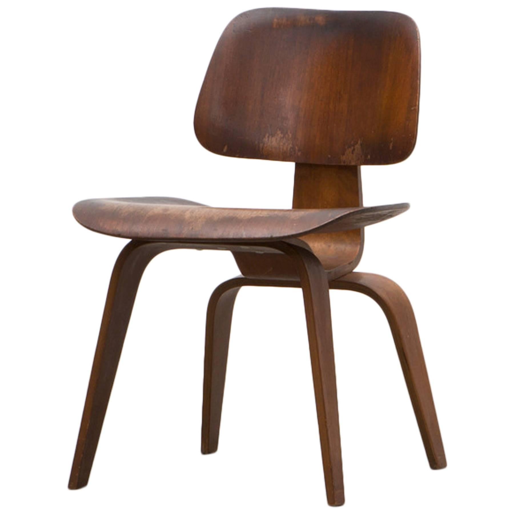 1940s Dark Brown Walnut DCW Chair by Charles & Ray Eames For Sale