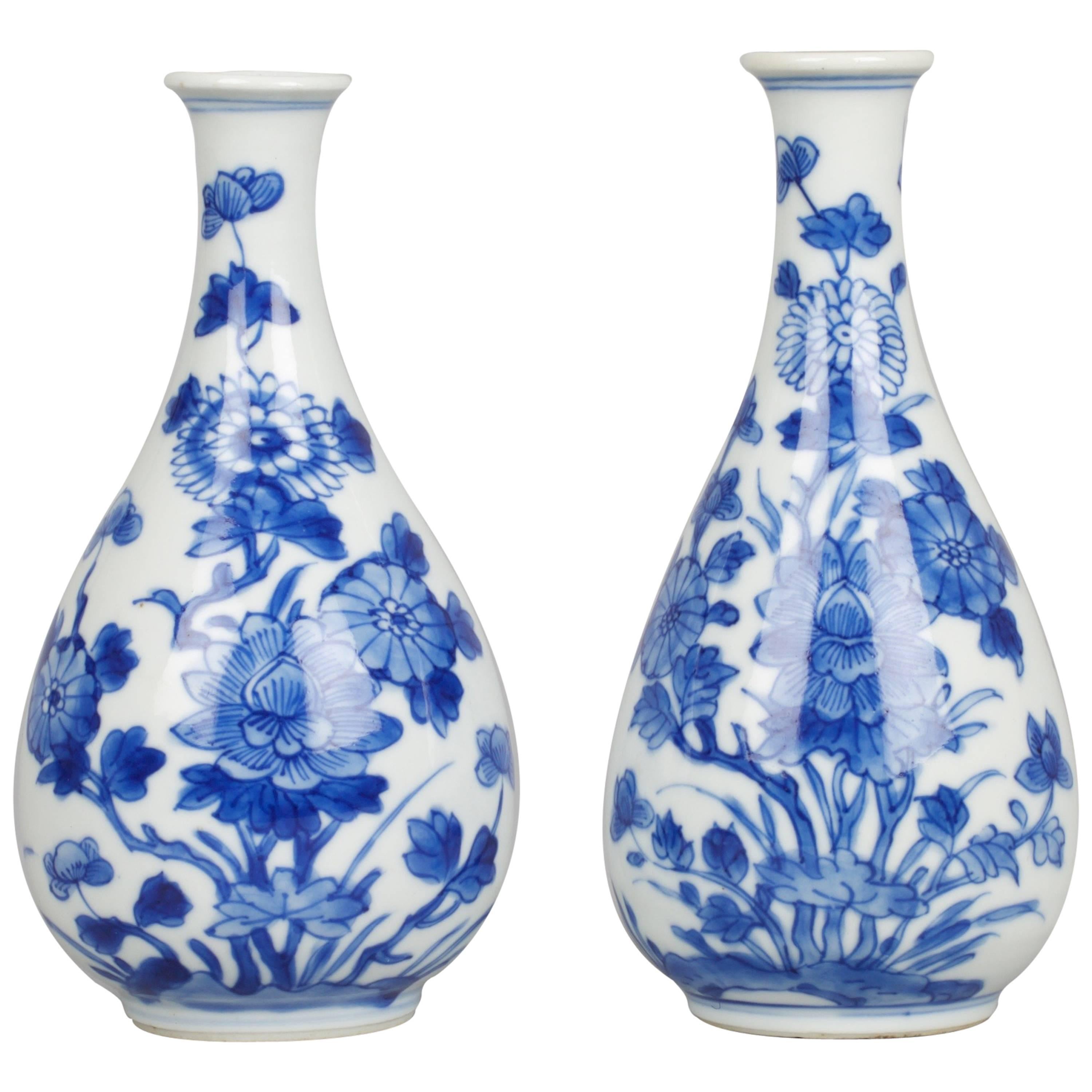 Pair of Chinese Porcelain Blue and White Miniature Bottle Vases, 17th Century For Sale