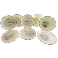 Set of Eight Hand-Painted and Signed Royal Doulton Fish Plates, 1902-1922