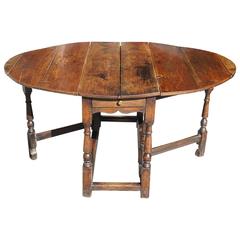 Antique English Late 18th Century Oval Yew Wood Drop-Leaf Dinning Table