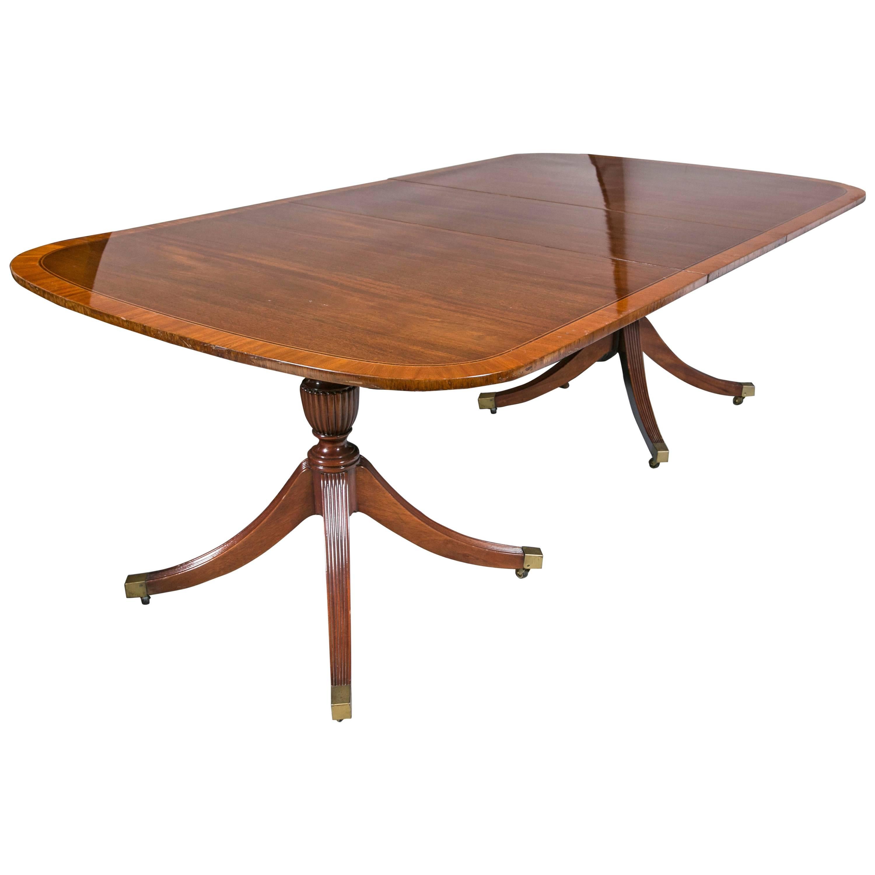 Georgian Style Mahogany Banded Dining Table by Baker with Two Leaves