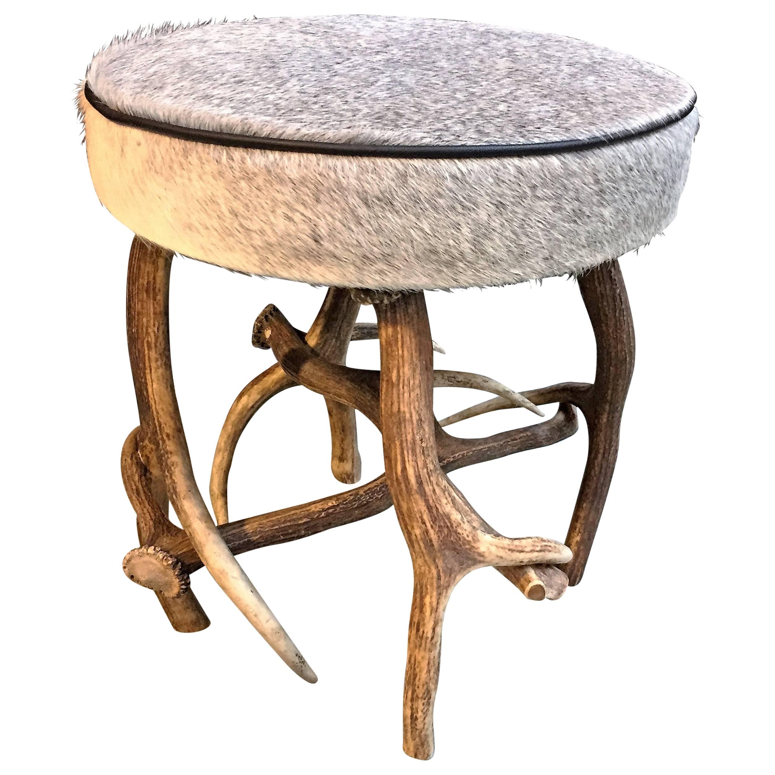 Antler stool with grey cowhide