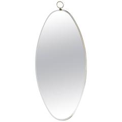 1960s Elongated Oval Mirror with Brass Finial
