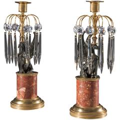 Pair of Early 19th Century Gilt-Brass Candlesticks with Bronzed Griffins on Drum