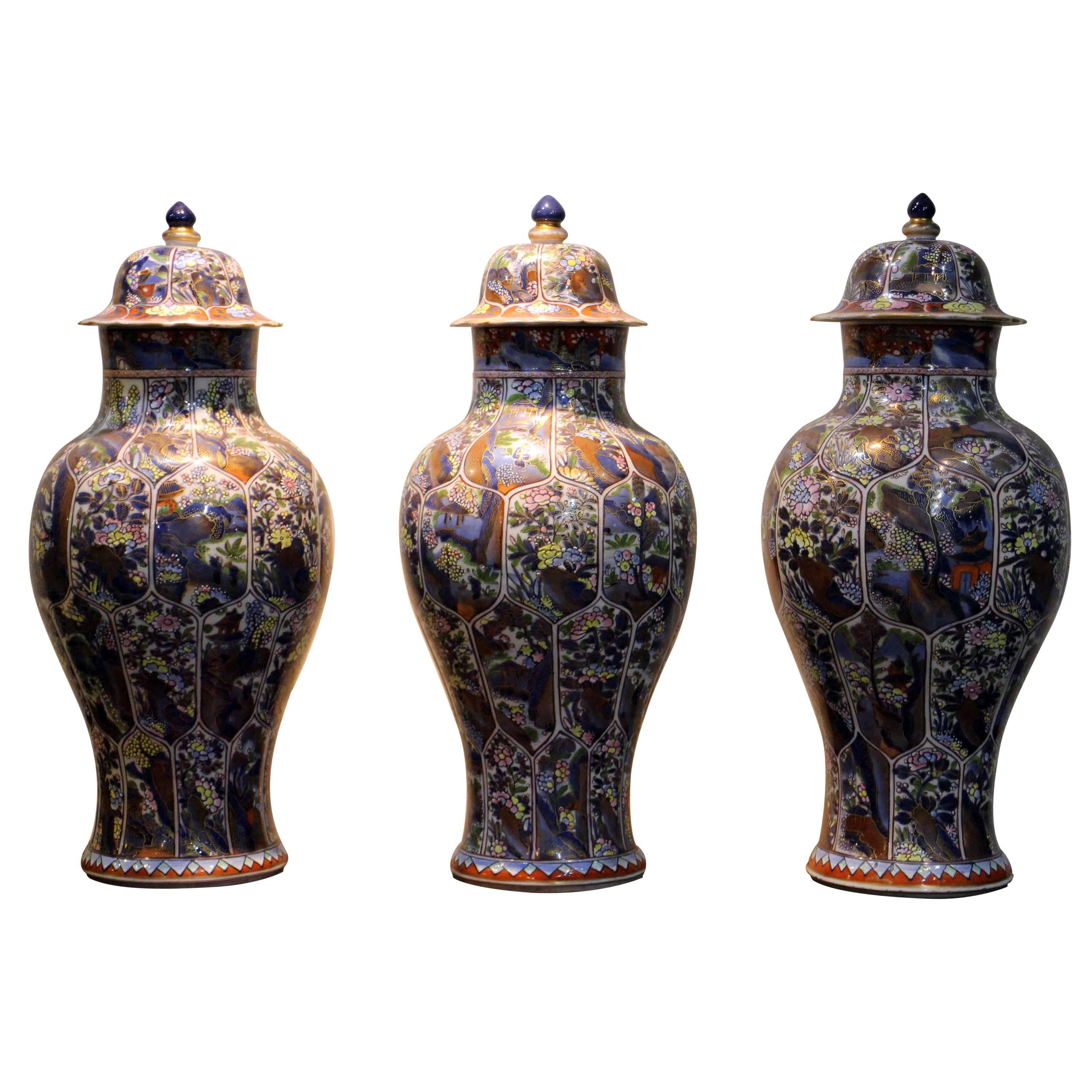 Three Antique Chinese 'Clobbered' Blue and White Vases and Covers  For Sale