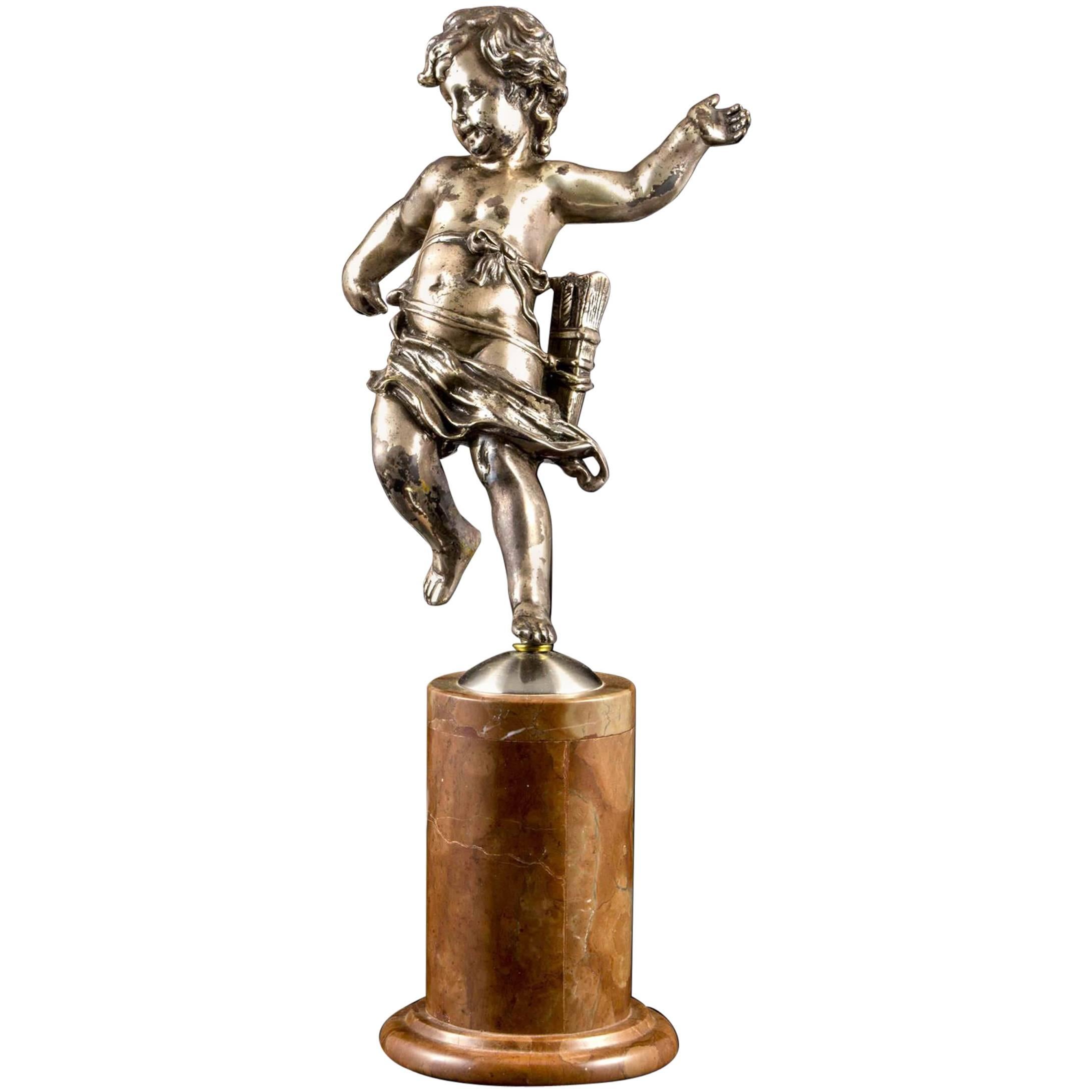 Silvered Bronze Putti Attached to Marble Pedestal Stand For Sale