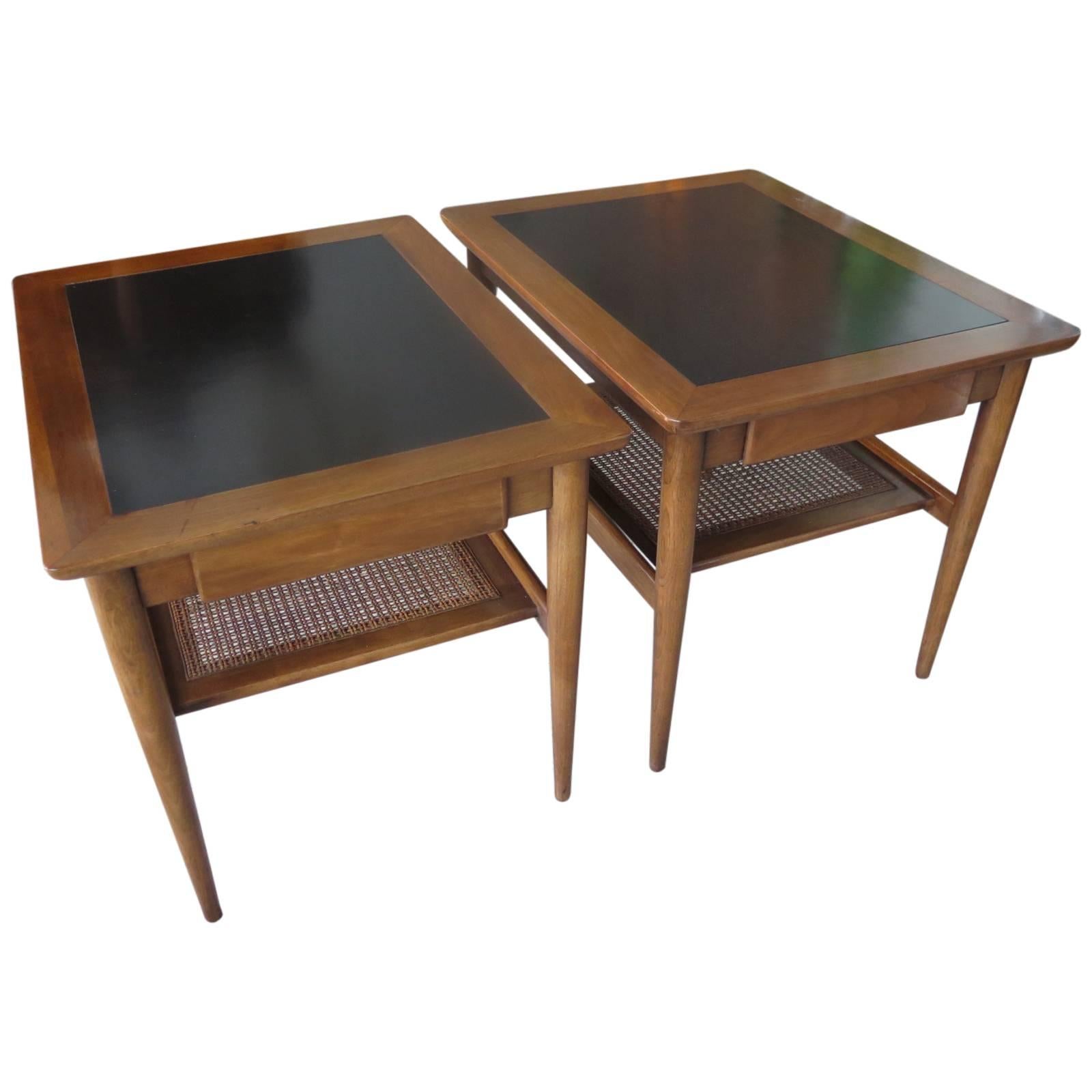 A Pair of American of Martinsville Occasional Tables with Caned Shelf For Sale
