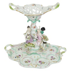 Meissen Figural Centerpiece with Basket on Top and Cherubs Around