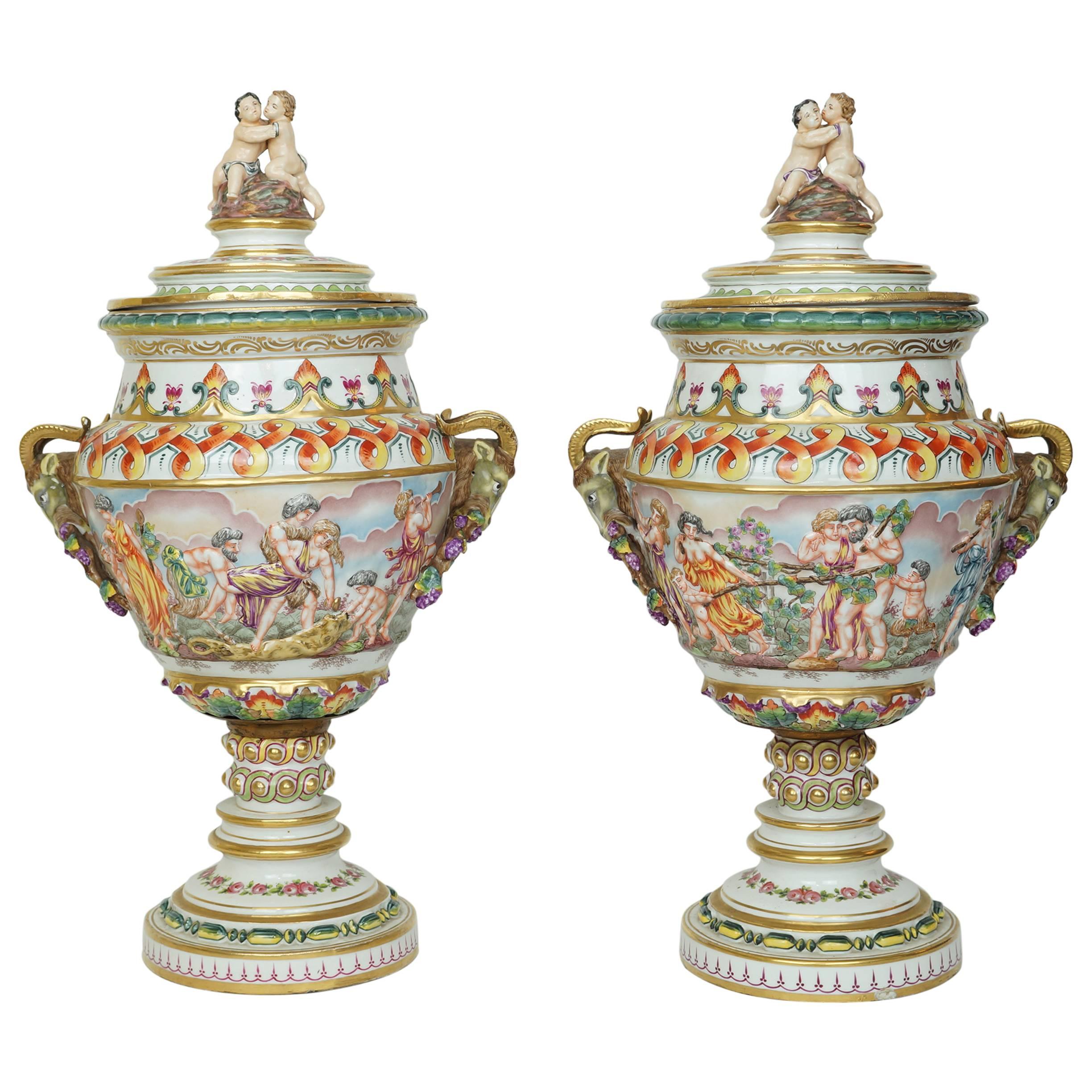 Pair of Porcelain and Bronze Capodimonte Figural Urns with Ram's Head