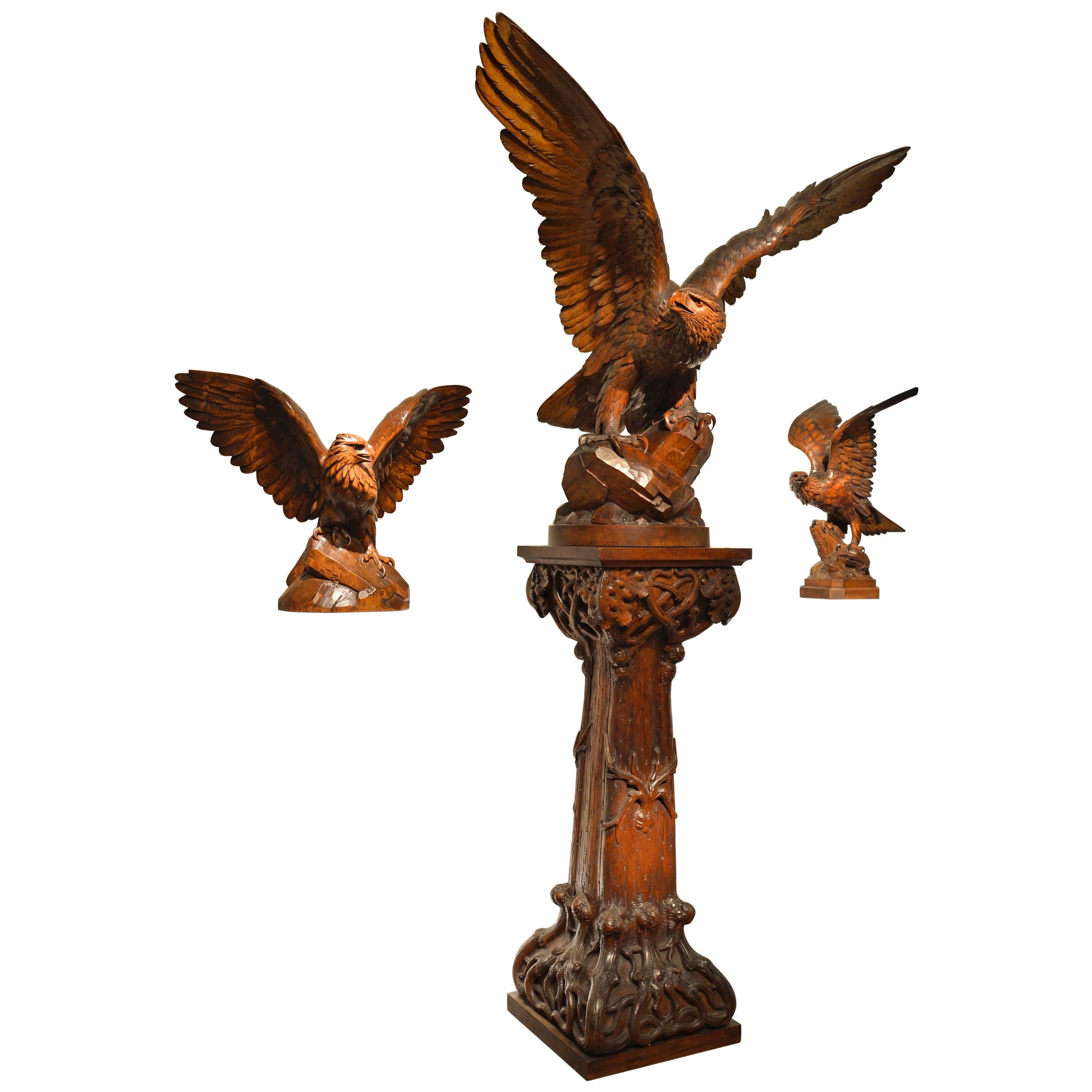 An impressive and monumental ‘Black Forest’ walnut carving of a Golden eagle per