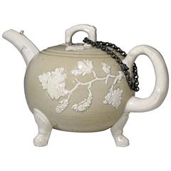 Teapot drab coloured salt-glazed stoneware with crabstock handle and shell paw f