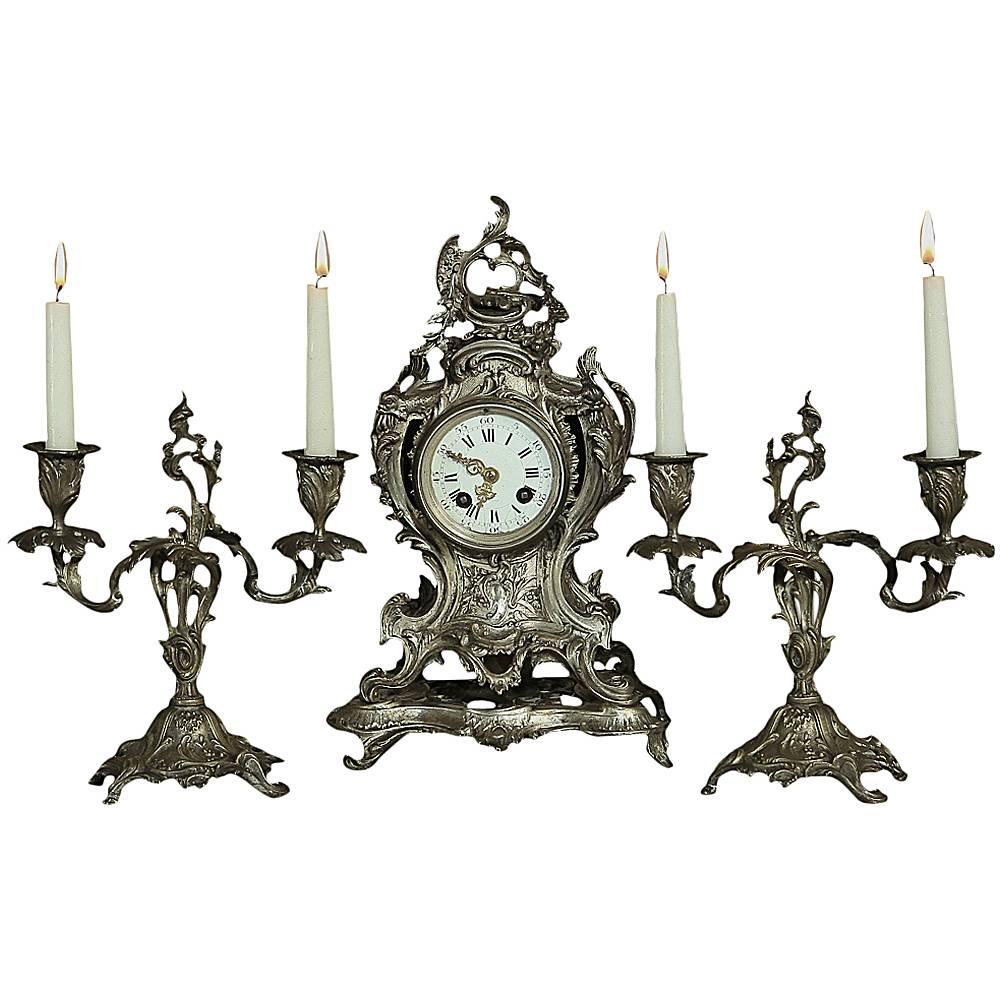 19th Century French Rococo Bronze Mantel Clock and Pair of Candlesticks