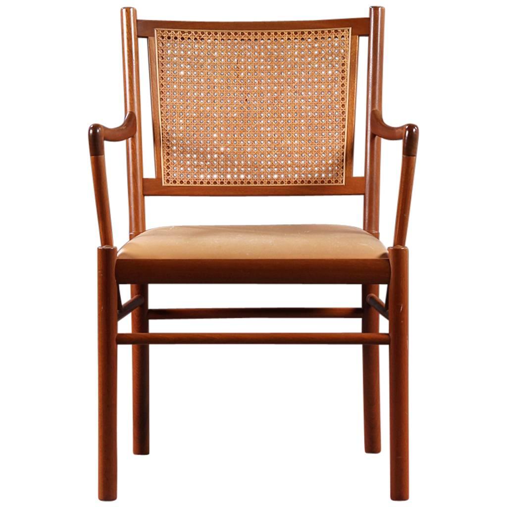 Ole Wascher leather and cane, mahogany arm chair