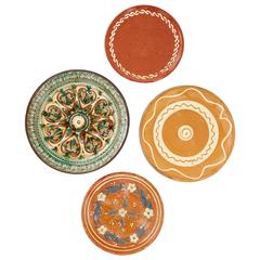 Set of Four Glazed and Hand-Painted Terracotta Serving Plates, Sweden and Italy