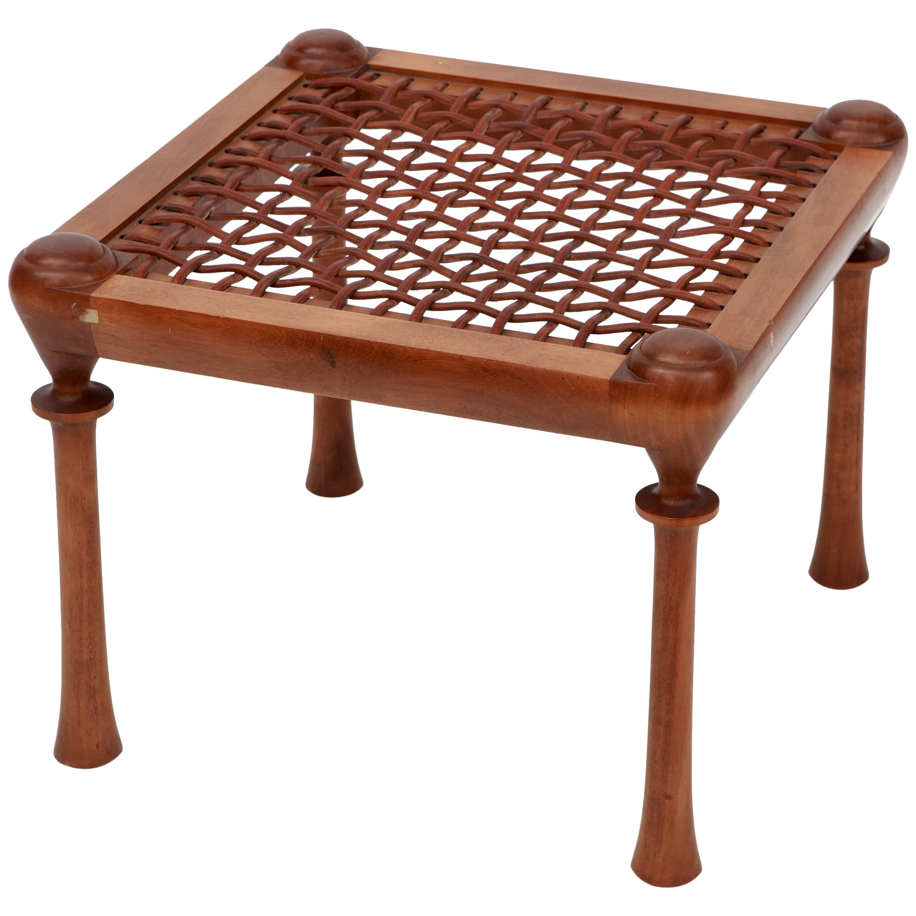 Four-Legged Walnut Stool with Interlaced Leather Straps Inside the Frame For Sale