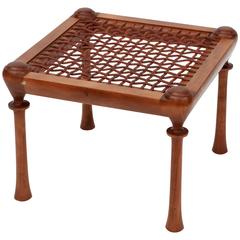 Four-Legged Walnut Stool with Interlaced Leather Straps Inside the Frame
