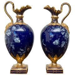 Pair of Royal Crown Derby Porcelain Cobalt-Blue Ground Ewers, circa 1893