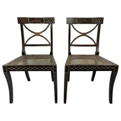 Pair of Regency Period Painted and Parcel-Gilt Chairs with Cane Seats