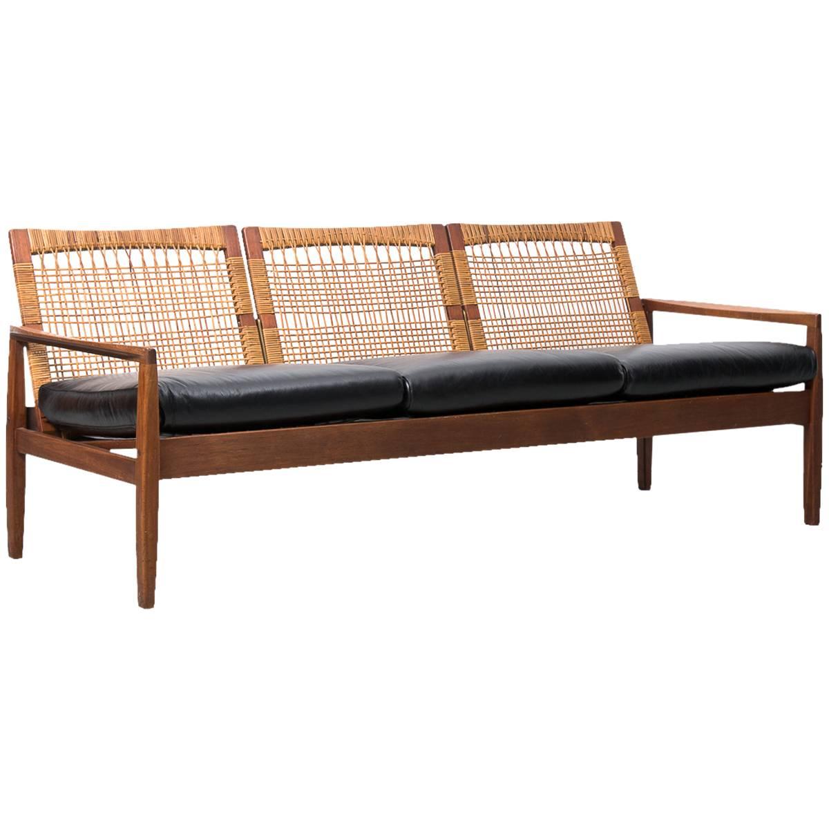 Hans Olsen Rattan-Backed Midcentury Danish Leather Sofa