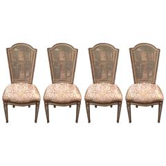 Four Hollywood Regency Style Caned and Painted Dining Chairs